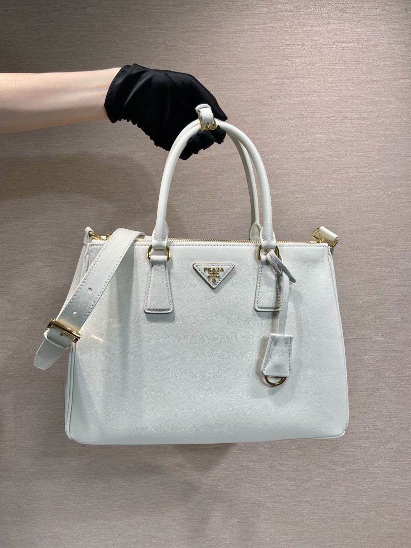 Pra*a top handle bags